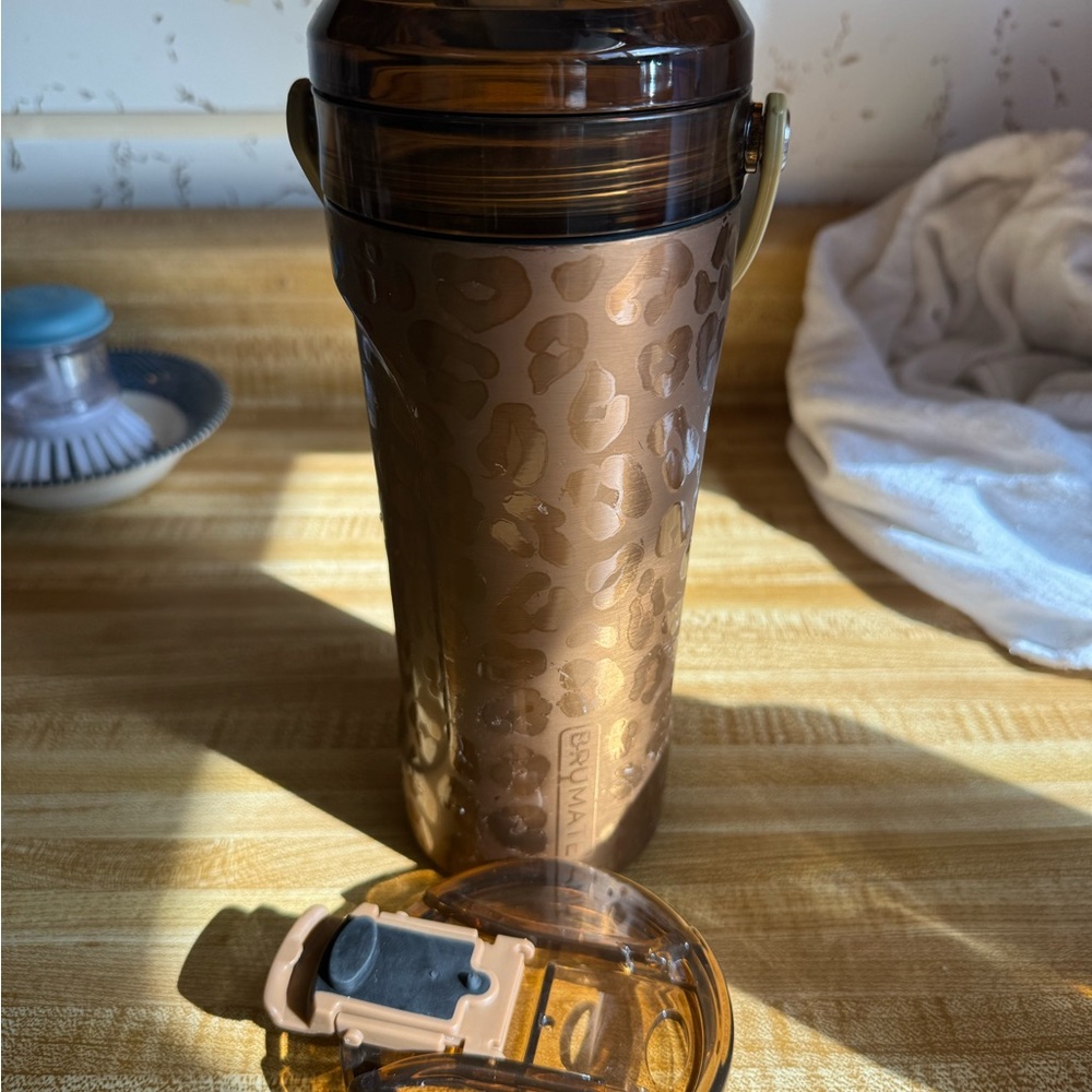 BrüMate Gold Leopard Multishaker bottle with multiple lids.